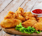 Aile de poulet pané, frites